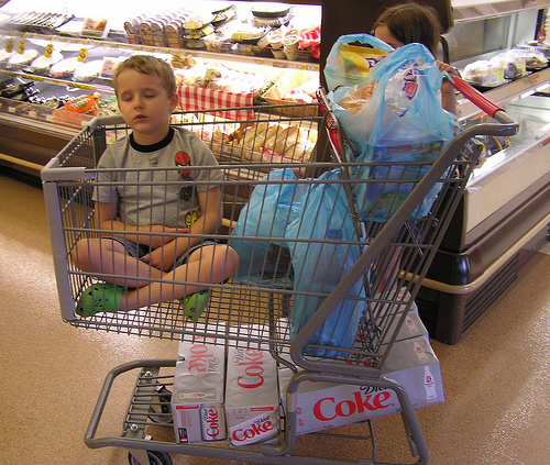 child in shopping cart (image courtesy of Flickr)