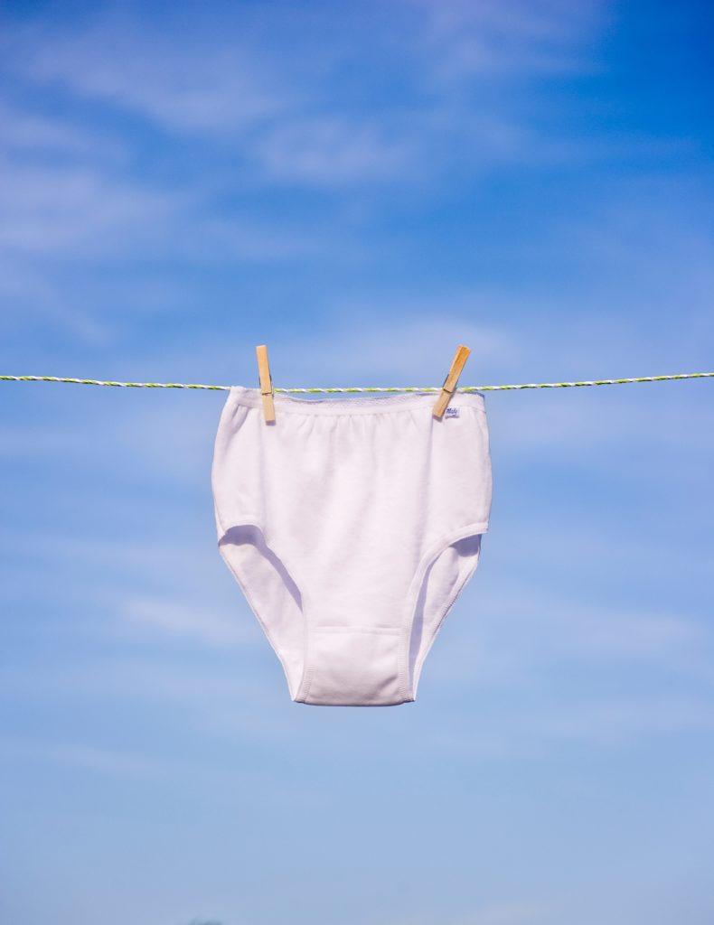 pinned and hanged white underwear